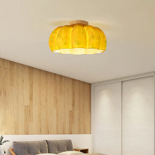 Modern yellow pumpkin resin ceiling light, wood detail installed
