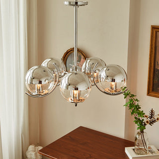Modern silver space ball chandelier illuminated — glass metal warm
