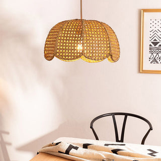 Round rattan pendant side view — woven brown eco fixture