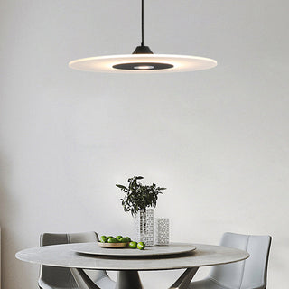 Flat panel LED pendant light over contemporary dining area
