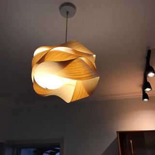 Geometric pendant light with natural wood and warm glow