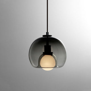 Handblown glass orb pendant with warm amber lampshade