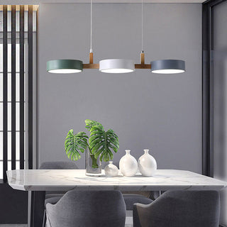 Iron wood pendant with three adjustable lamp heads