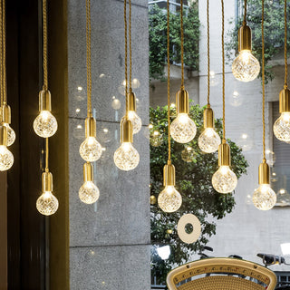 Sleek LED pendant detail — modern glass ceiling fixture