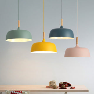 Industrial cream pendant in interior — small metal glass lamp