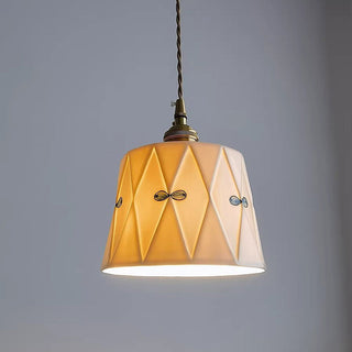 Classic ceramic pendant close-up — white dining room hanging lamp