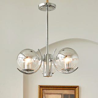 Modern silver glass space chandelier detail — metal frame warm