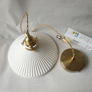 Retro ceramic pendant in interior — pleated shade hanging lamp