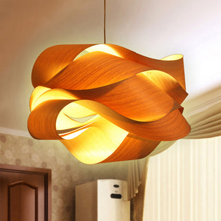 Modern wood pendant casting warm ambient kitchen glow