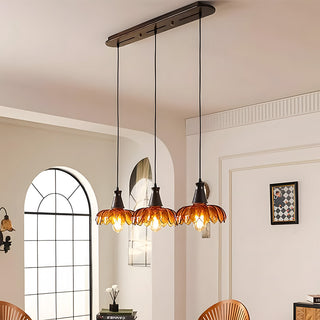 Amber glass flower pendant in interior — retro decorative lamp