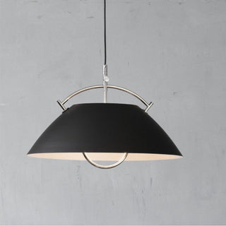 Modern Nordic pendant hanging in dining room interior
