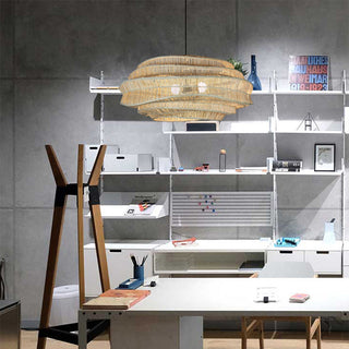 Rattan pendant close-up — cage style modern hanging lamp