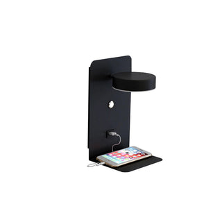 LED wall sconce USB phone charger close-up — modern