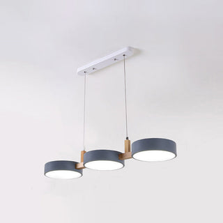 Contemporary pendant with three adjustable iron wood heads
