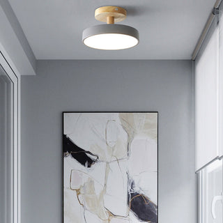 Colorful ceiling lamp close-up, round wood iron flush mount
