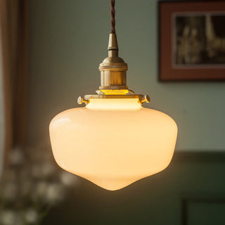 Vintage glass lantern pendant casting warm nostalgic glow