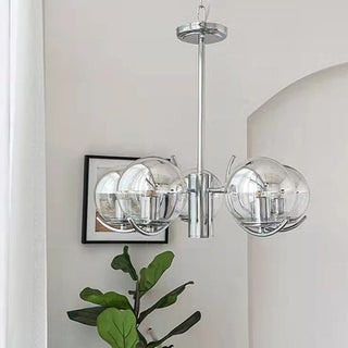 Silver glass space chandelier ambient — modern metal frame warm