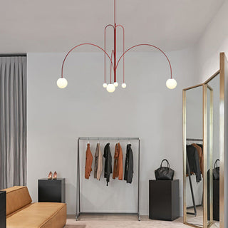 Intricate red Art Deco pendant hanging in grand interior