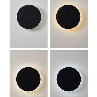 Minimalist round metal LED outdoor wall lamp close-up — waterproof