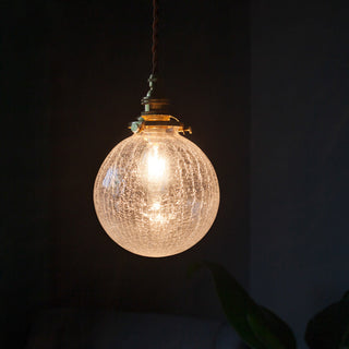 Glass globe pendant from above — black gold elegant hanging lamp
