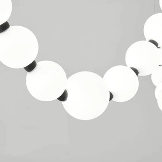 Chandelier with white ball design and copper crystal glass