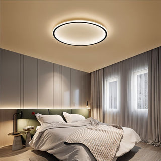 Minimalist ultra-thin round ceiling light in living room