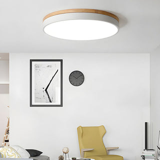 Round wooden LED ceiling fixture – natural wood grain close-up