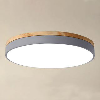 Wood tone round LED ceiling fixture – warm white light setting
