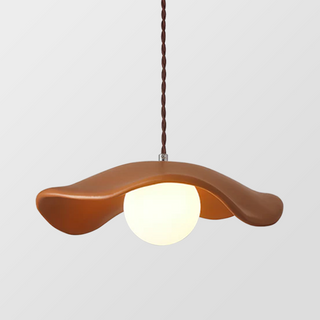 Contemporary resin pendant light with wide shade