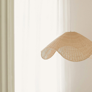 Boho rattan ceiling fixture with adjustable hanging cord