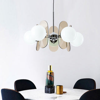 Art Deco pendant casting prismatic light pattern on ceiling