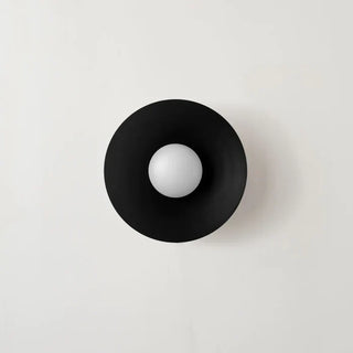 Round metal ceiling light installed in kitchen, modern flush