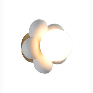 Ceramic pink floral wall lamp close-up — flower bedside sconce