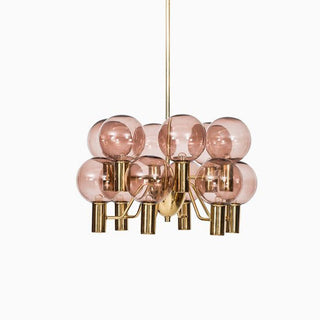 Contemporary pink glass chandelier ambient — 12-bulb decorative warm