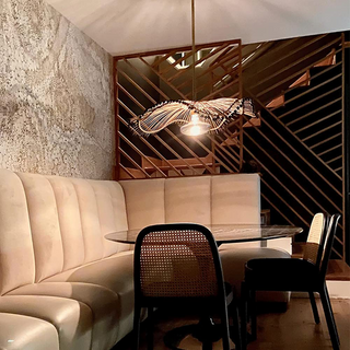 Boho rattan wave pendant detail — modern hanging fixture