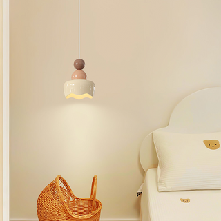 Bedside warm glow pendant top view — cream adjustable fixture