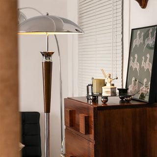 Modern chrome floor lamp illuminated — LED warm ambient