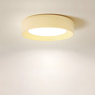 Yellow round LED ceiling light – creamy kids room lamp