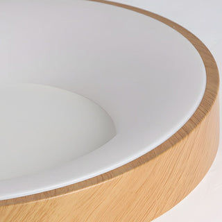 Round wood LED ceiling lamp in room, warm natural ambient