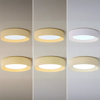 Creamy round ceiling lamp kids room – yellow LED close-up
