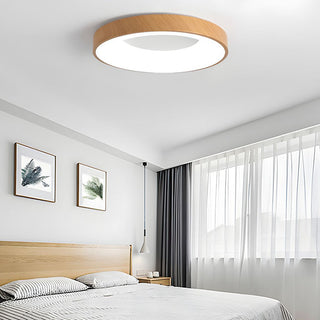 Round wood ceiling lamp close-up, natural warm LED design