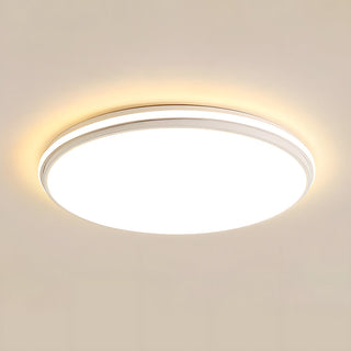 Circular white metal LED ceiling light – minimalist installed