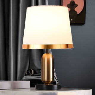 Bullet base golden lamp front — sleek luxury warm glow