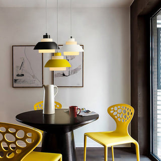 Aluminum pendant lamp close-up — minimalist dining room fixture