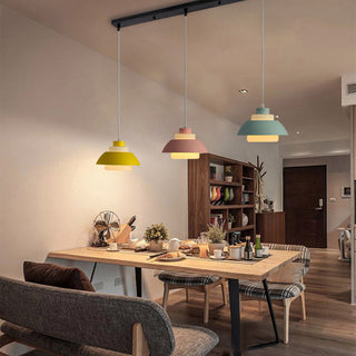 Minimalist aluminium pendant hanging in dining room