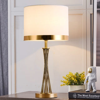 Designer golden table lamp — modern desk lighting elegant fixture