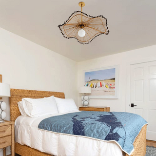 Rattan wave pendant side angle — modern boho ceiling lamp
