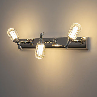 Modern silver LED bathroom vanity wall lamp illuminated — fixture