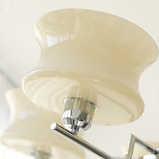 Brass glass gold chrome chandelier dining room overhead view