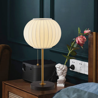 White silk bedside lamp close-up — classic shade detail